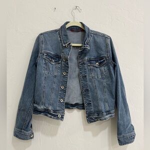 Denim jacket, blue. Button up.
